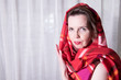 © Jürgen Hüls - Portrait attractive woman with scarf around her head