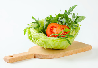 Canvas Print - Rocket salad in lettuce bowl