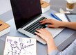 © lenetsnikolai - Young businesswoman working on a laptop