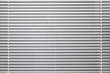 © evannovostro - Modern white window blinds background texture