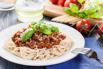 Wall Mural - Spaghetti bolognese with cheese and basil