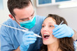 © Production Perig - Young attractive woman being cured by a dentist