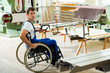 © Firma V - worker in wheelchair in a carpenter's workshop