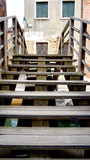 Fototapeta  - wooden stair bridge cross canal