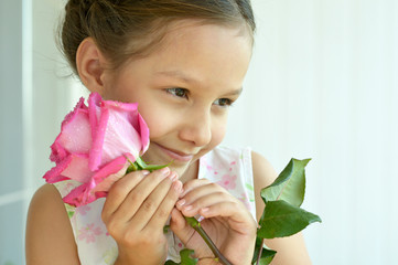 Poster - Little girl with  rose flower