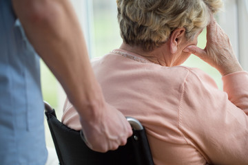 Poster - Sad woman on wheelchair