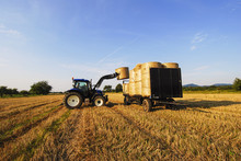 GERMANY  - Tractor Impales On Straw Bales And Loads The Bales On The Trailer