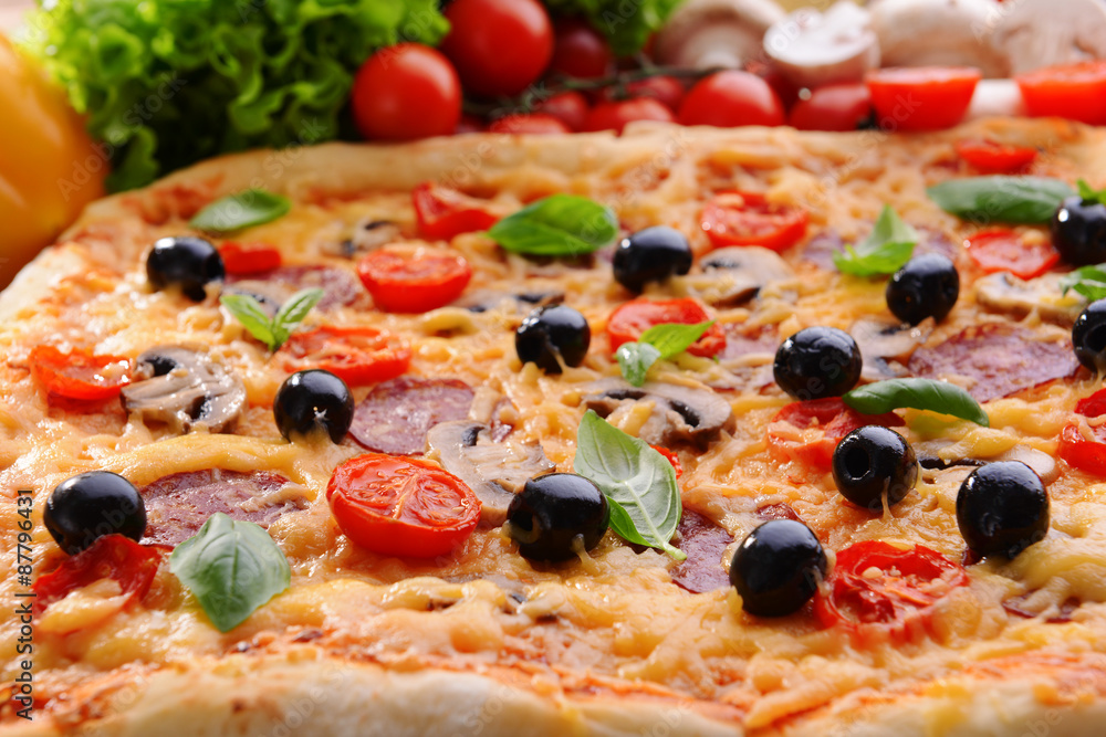 Delicious homemade pizza on table close-up