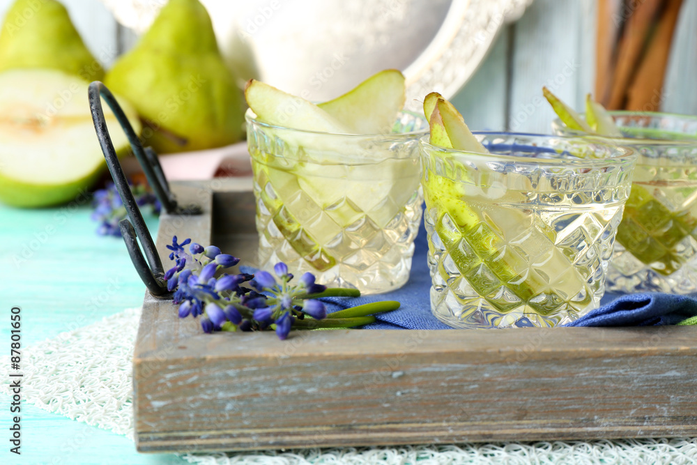 Pear juice with fresh fruits on table close up
