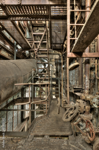 Fototapeta na wymiar Old and rusted elements in an abandoned power plant