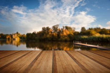 Wall Mural - Beautiful sunset over Autumn Fall lake with crystal clear reflec