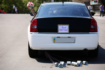 Wall Mural - Wedding car with just married sign and cans