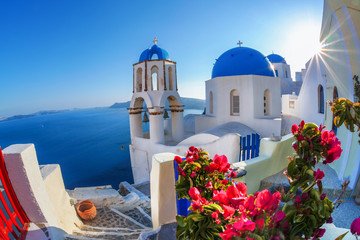 Santorini island with church against  sunset in Oia, Greece