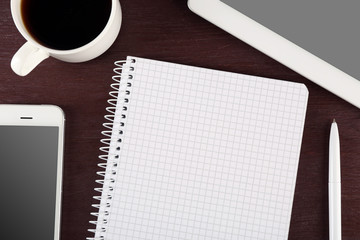 Top view of working place elements on wooden table