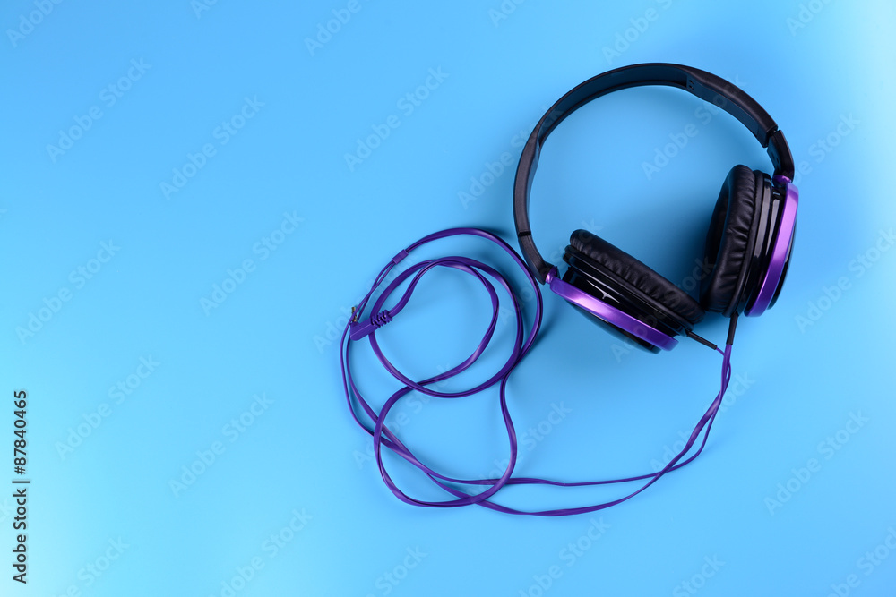 Headphones on blue background