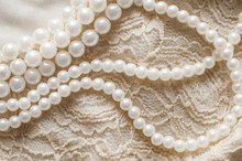 Pearl Necklace On Lace Clothes