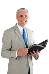 Wall Mural - Mature Businessman with Open Binder