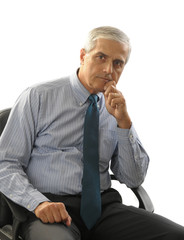 Wall Mural - Serious Middle Aged Businessman in Office Chair