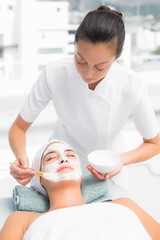 Wall Mural - Attractive woman receiving treatment at spa center