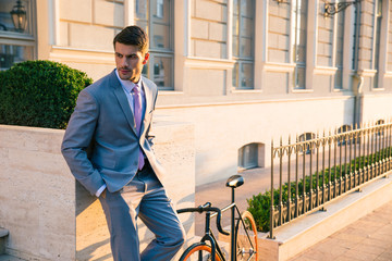 Poster - Businessman standing outdoors in town