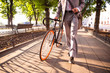 © Drobot Dean - businessman walking with bicycle