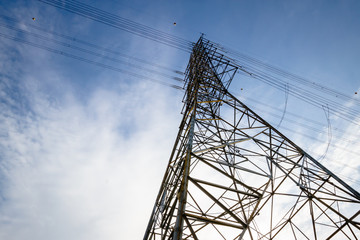 high-voltage line on the sky background