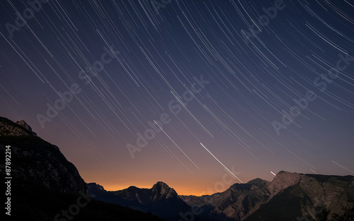 Startrails over the Apuan Alps at sunset, Tuscany, Italy Fotobehang