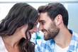 © WavebreakmediaMicro - Young happy couple smiling at each other