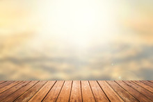 Wooden Floor With Sunset Sky Blurred Background