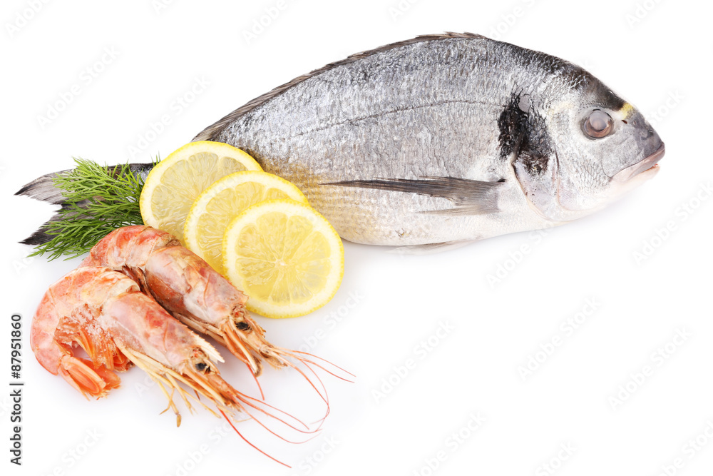 Fresh dorado fish with shrimps, dill and lemon isolated on white