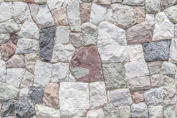 Wall Mural - Closeup the modern stone wall with cement surface background.