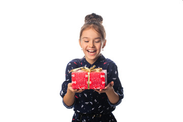 Female child receives a gift surprised and glad.