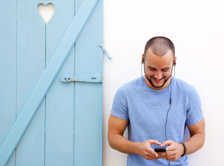 Sticker - Happy guy listening to music on mobile phone