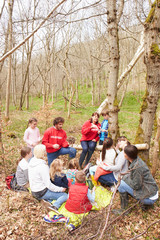 Wall Mural - Adults And Children Examining Bird's Nest At Activity Centre