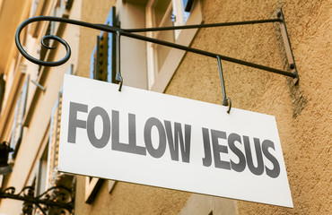 Follow Jesus sign in a conceptual image