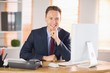 © WavebreakmediaMicro - Stylish businessman smiling at camera