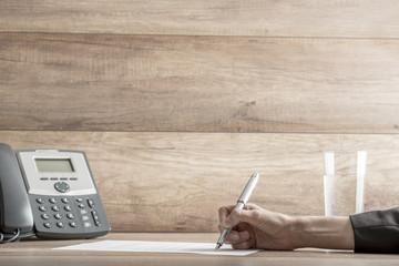 Wall Mural - Closeup of female lawyer or executive signing a contract