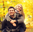 © Syda Productions - smiling couple having fun in autumn park