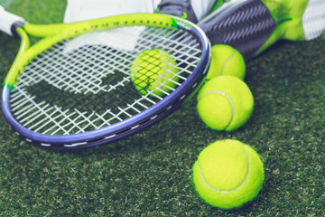 Tennis equipment on grass