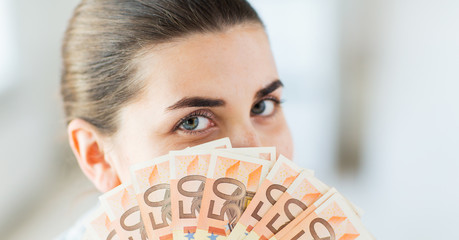 Sticker - woman hiding her face behind euro money fan