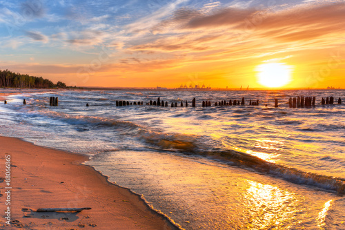 Fototapeta na wymiar Sunset on the beach at Baltic Sea in Poland