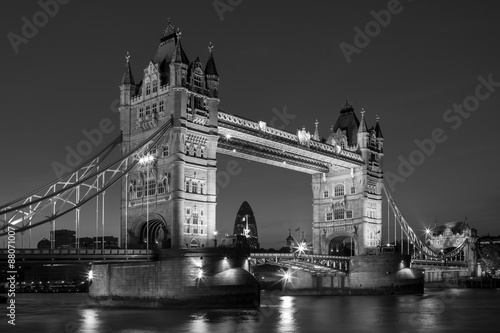 Fototapeta na wymiar Illuminated Tower Bridge at night in black and white, London, UK