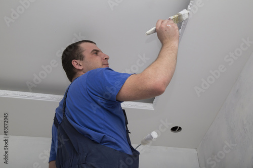 Renovation Of House Interior Man Worker Painting The