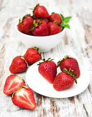 Wall Mural - Bowl with strawberries