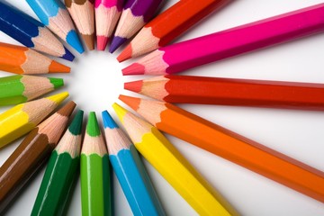 Wall Mural - Assortment of coloured pencils with shadow on white background