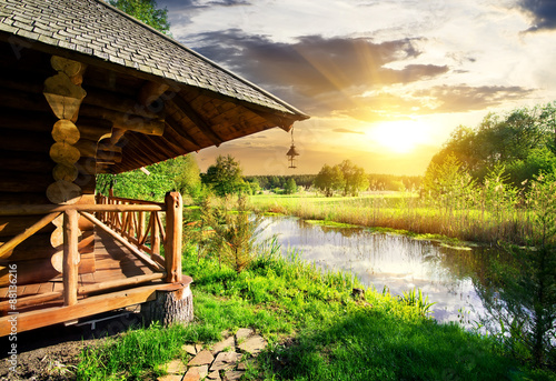 Баня река фото Bathhouse at sunset фотография Stock Adobe Stock