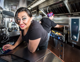 Blue Eyed Cashier On Food Truck