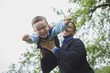 © Louis-Paul Photo - Father and son in forest on a meadow
