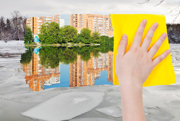 Poster - hand deletes ice block in river by yellow cloth