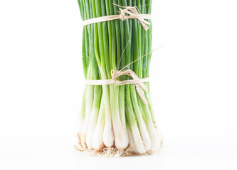 Wall Mural - Cut green onion isolated on the white background